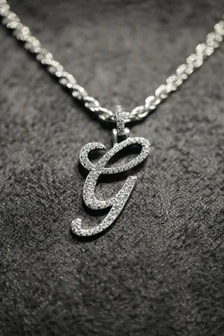 Silver letter G pendant