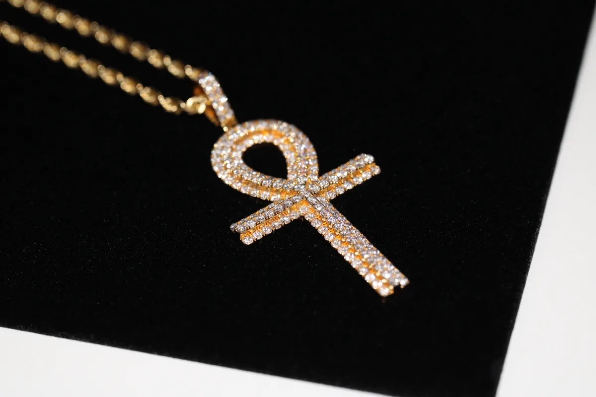 Yellow gold Ankh pendant on a rope chain