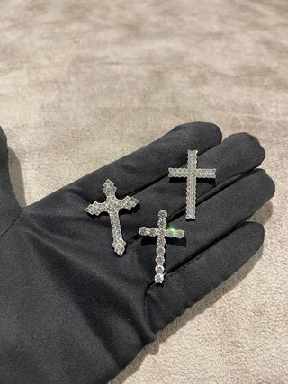 Three crosses, three scales